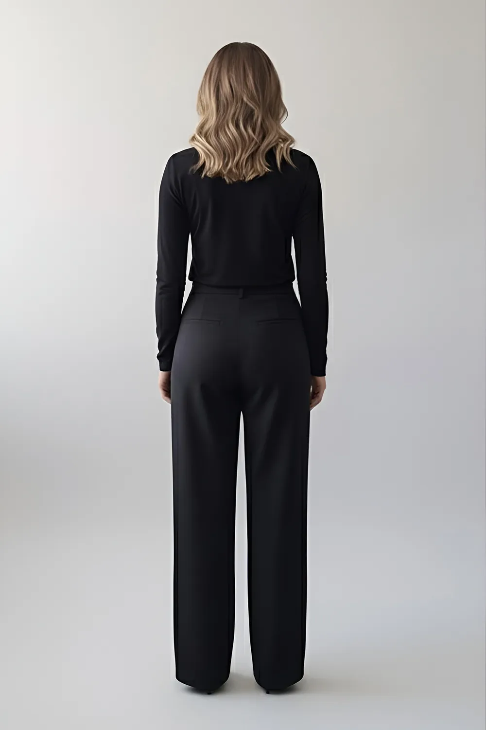 Чорний лонгслів з воланами