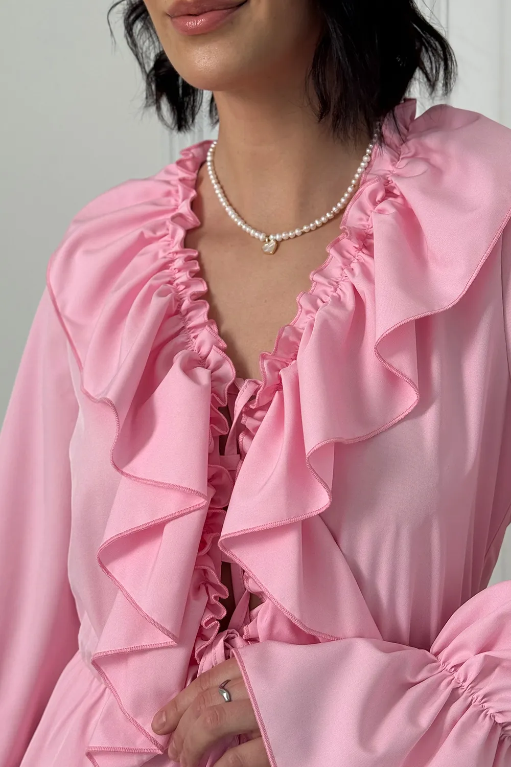 Pink light dress with ruffles