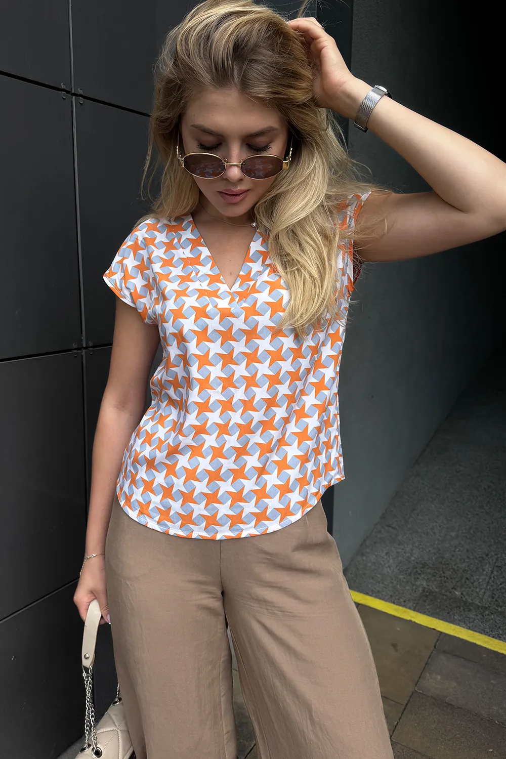 Lightweight orange staple blouse