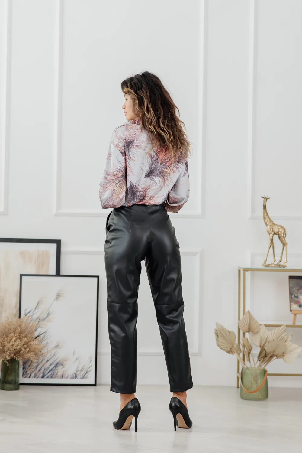 Black loose trousers made of eco leather