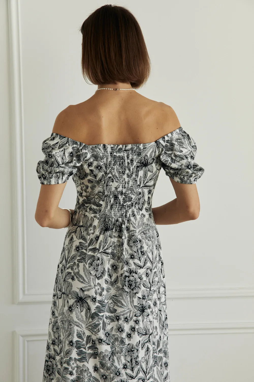 Black and white fitted midi dress
