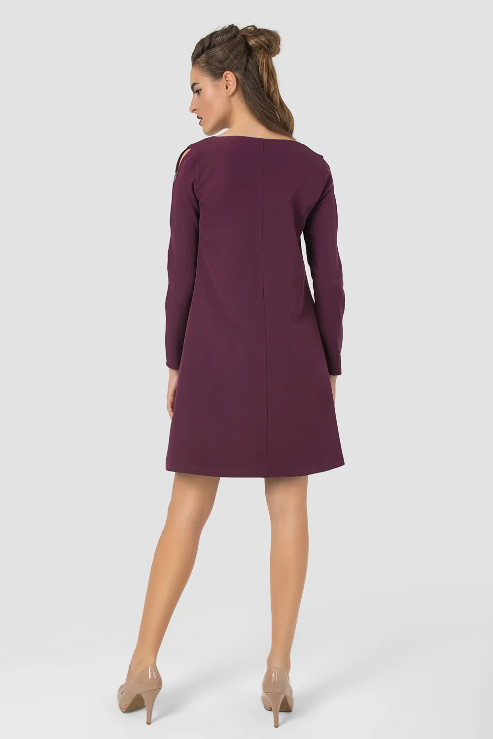 Dress with decorative inserts