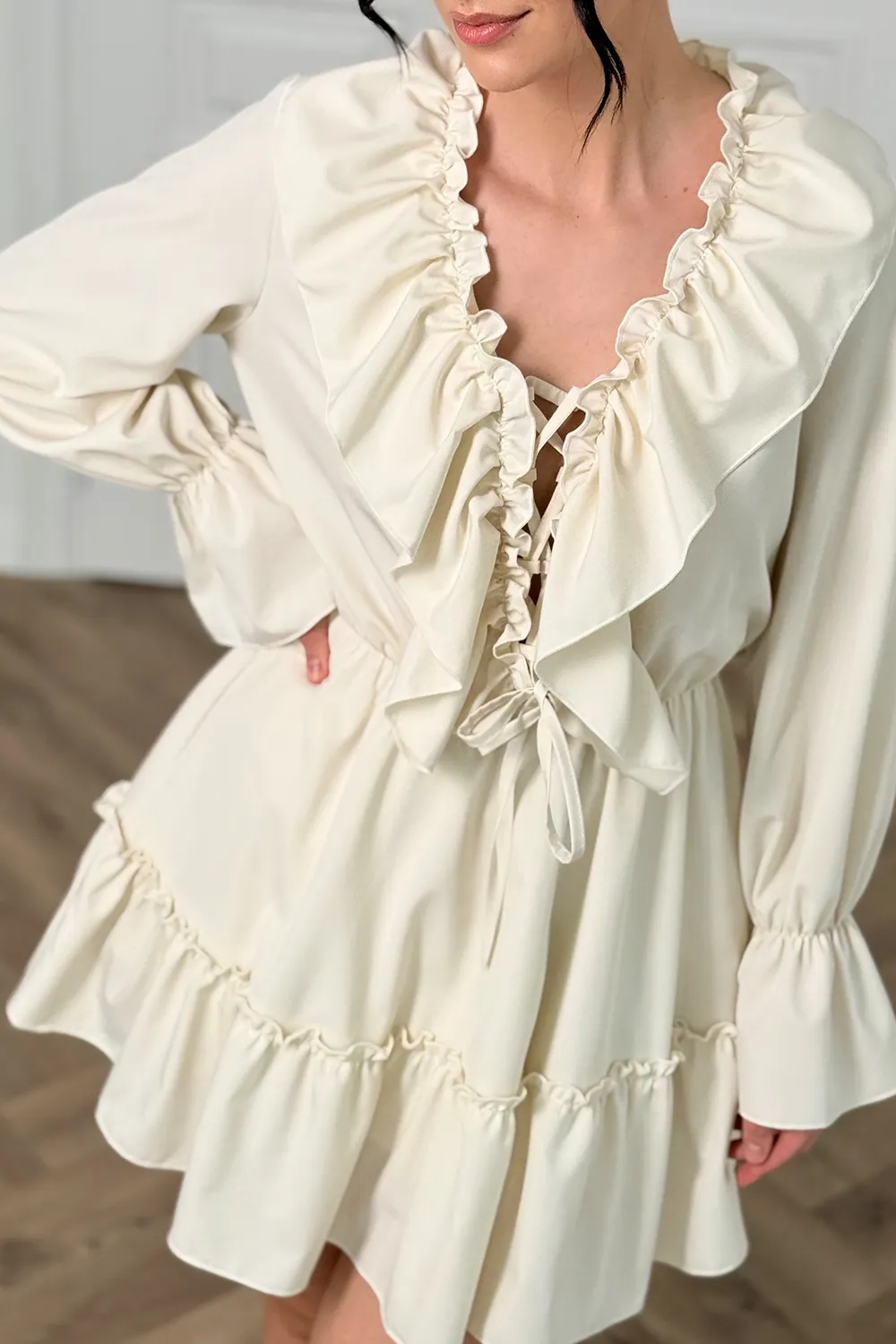 Milky light dress with ruffles