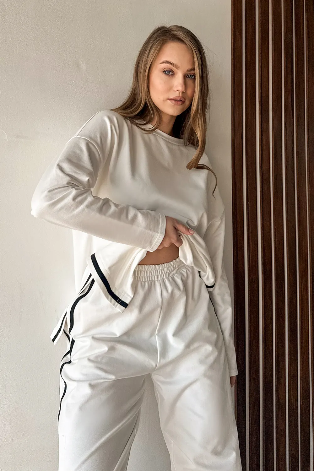 Milk suit with contrasting stripes
