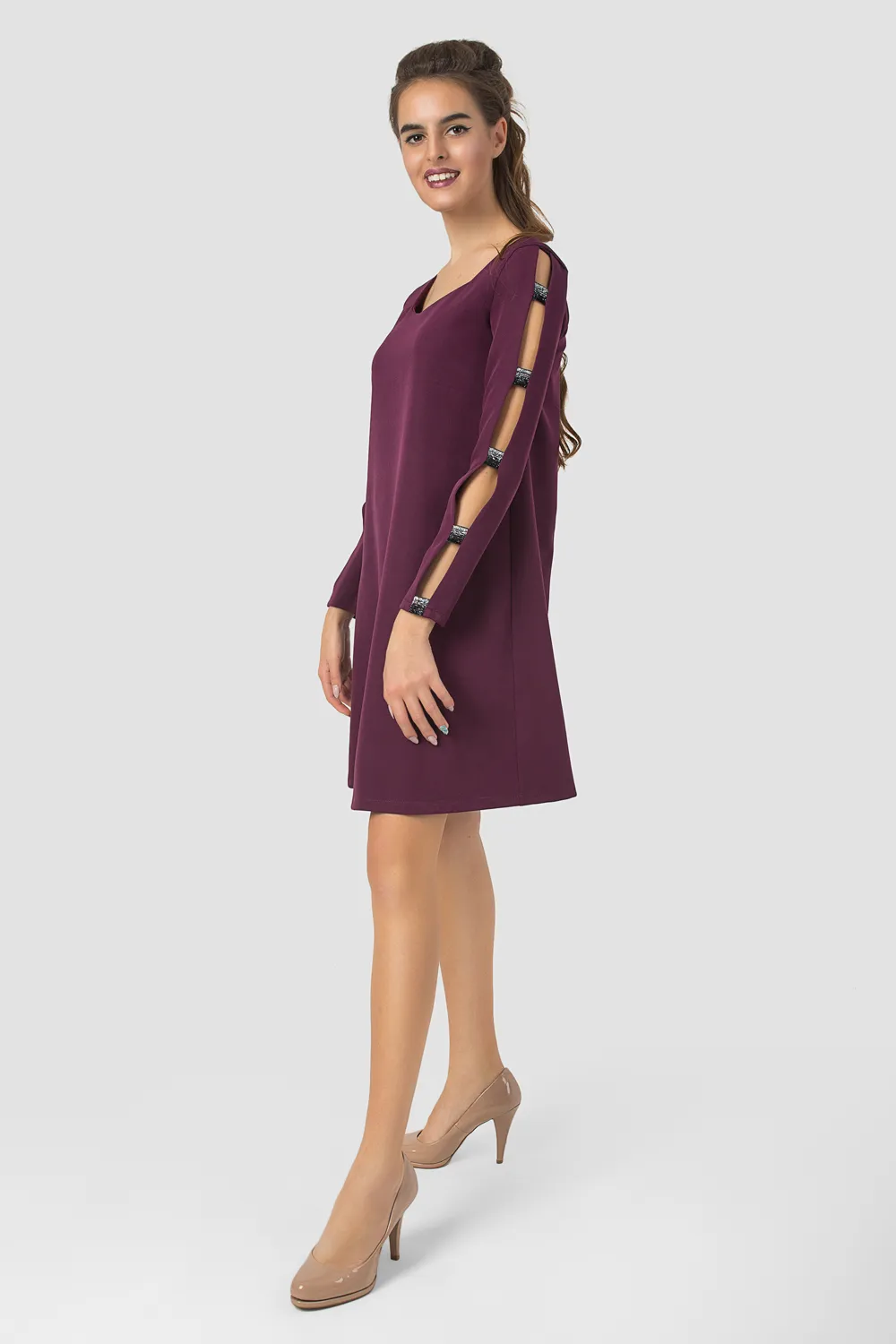 Dress with decorative inserts