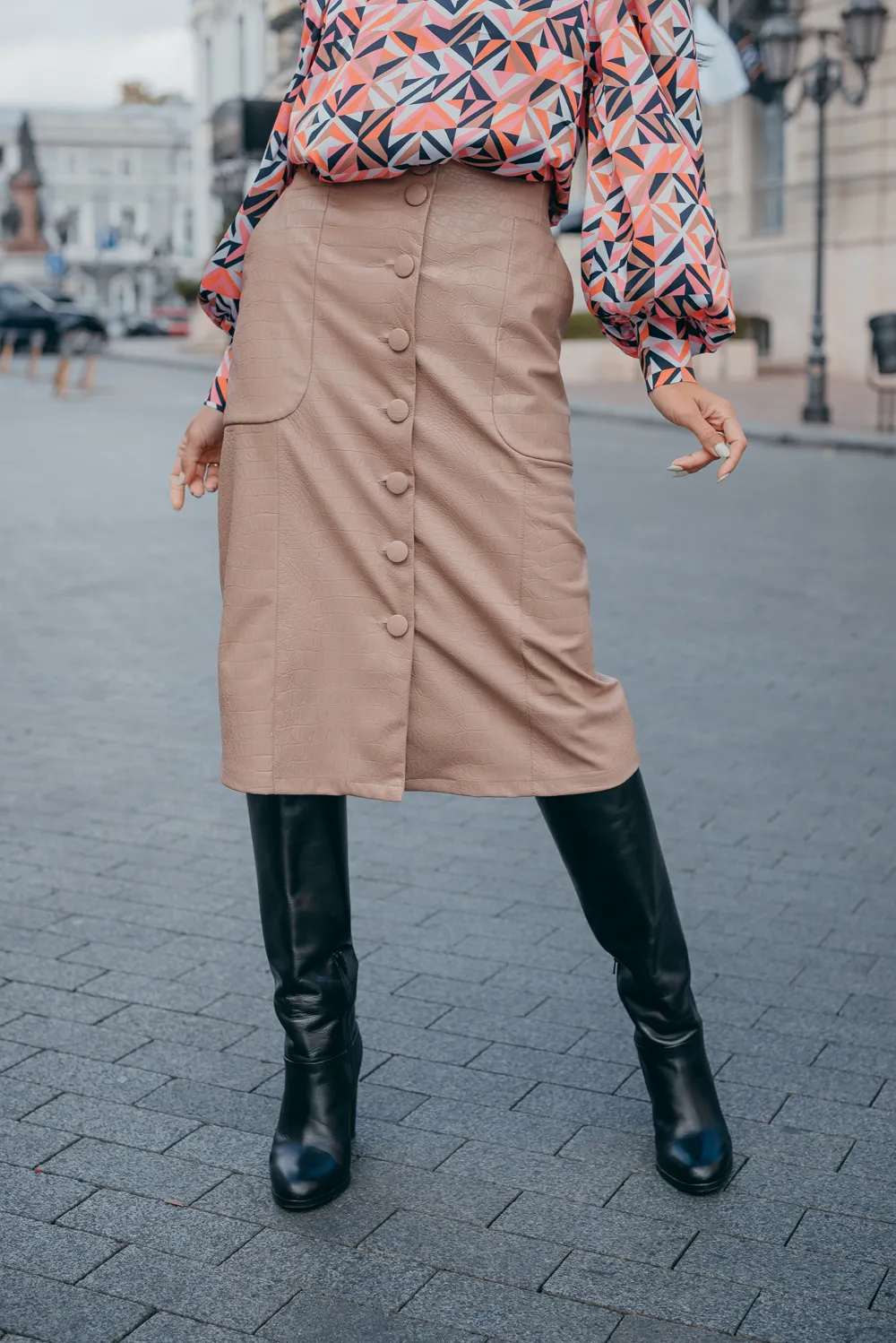 Midi skirt made of eco leather with buttons