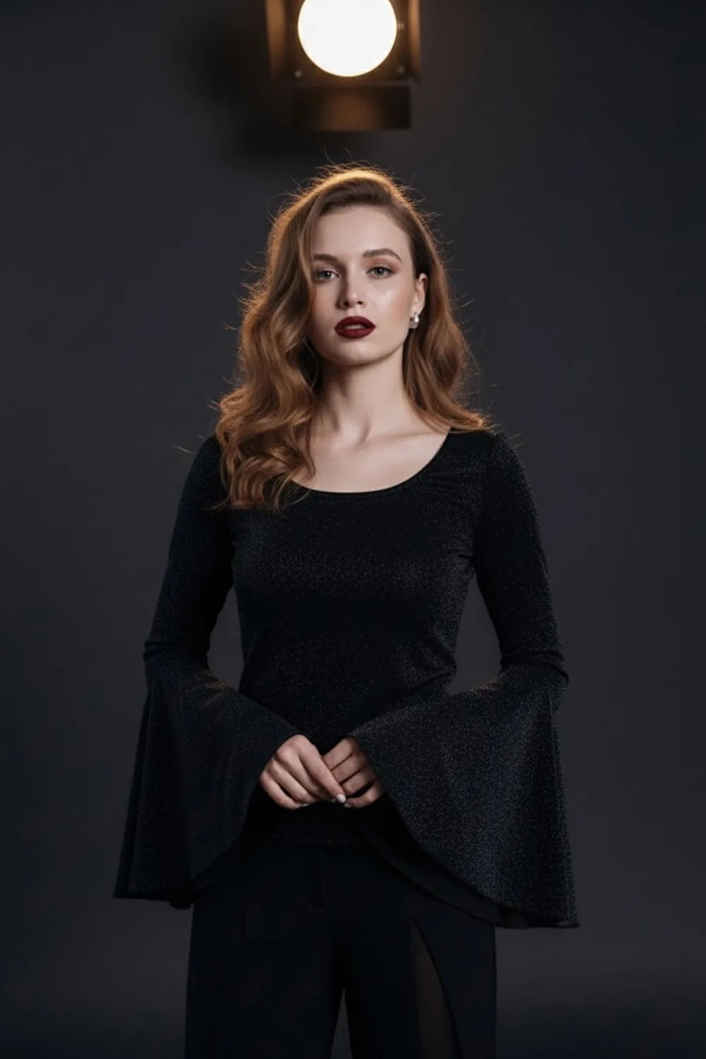 Чорний трикотажний топ із люрексу