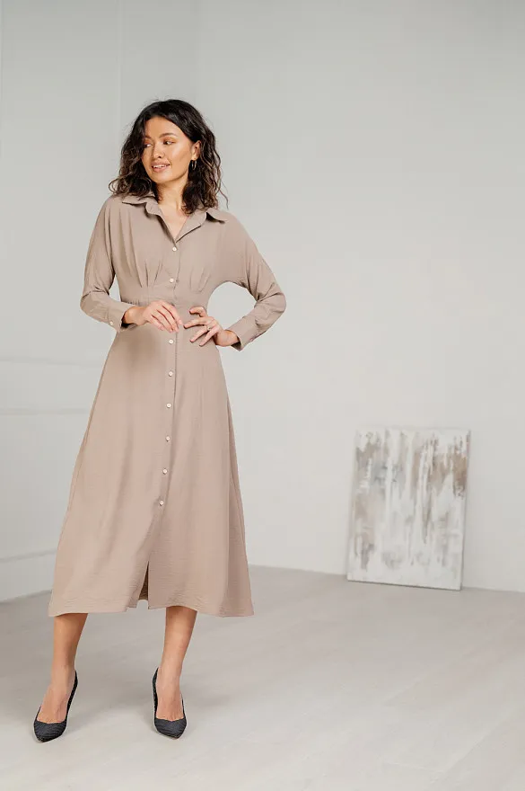 Semi-fitted dress with a spectacular A-line skirt in mocha color Semi-fitted dress with a spectacular A-line skirt in mocha color