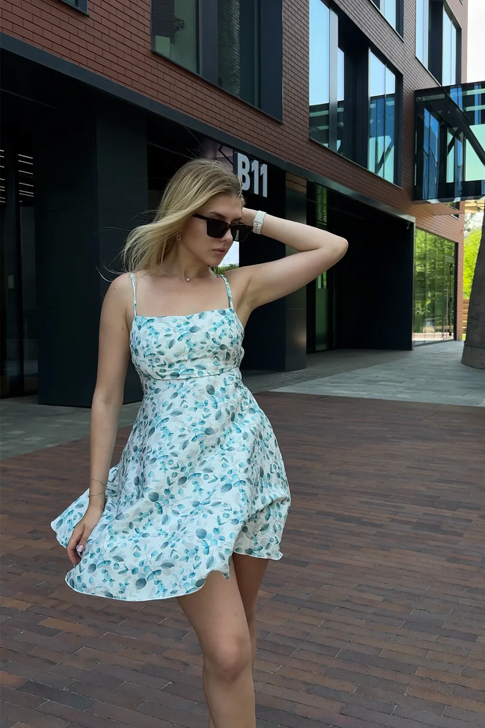 Turquoise dress with open back and ties